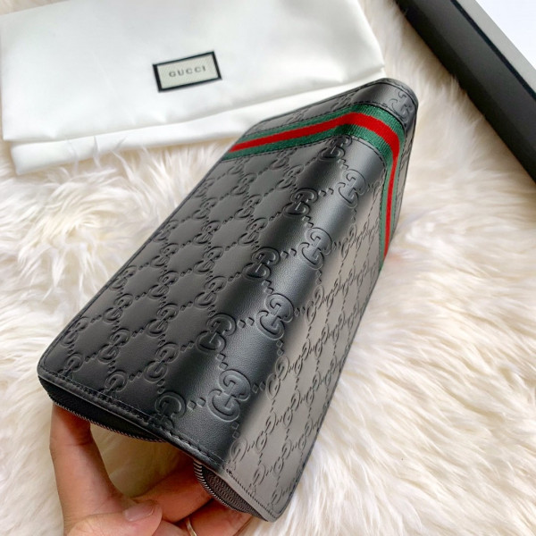 G*u*i leather zip around wallet