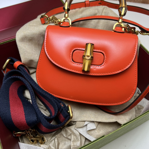 G*u*i mini top handle bag with bamboo