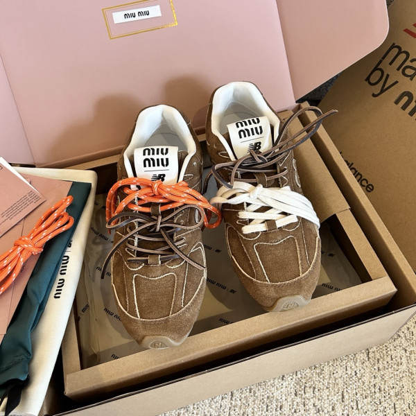 M*um*u x new balance sneaker